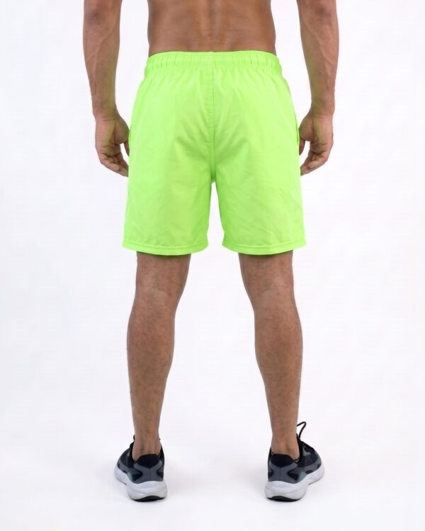 PANTALONETA NIKE VERDE NEÓN